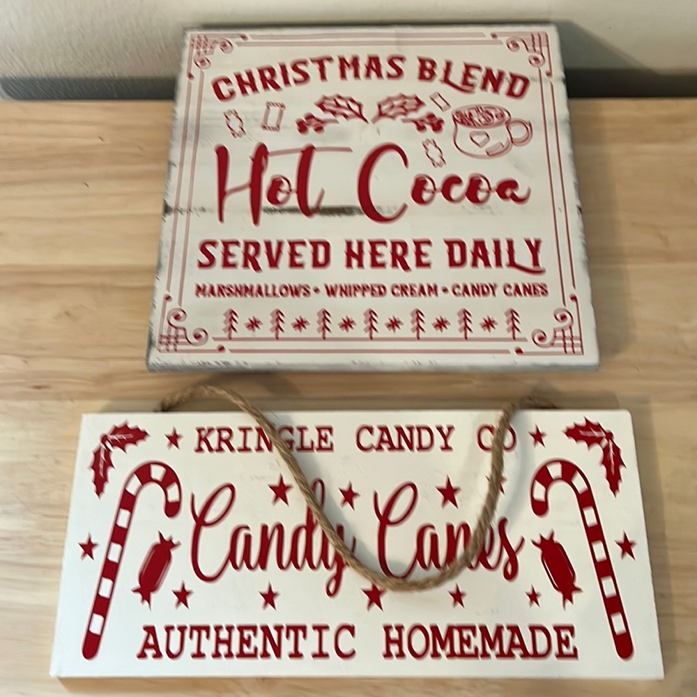 Set of two red and white hanging Christmas signs